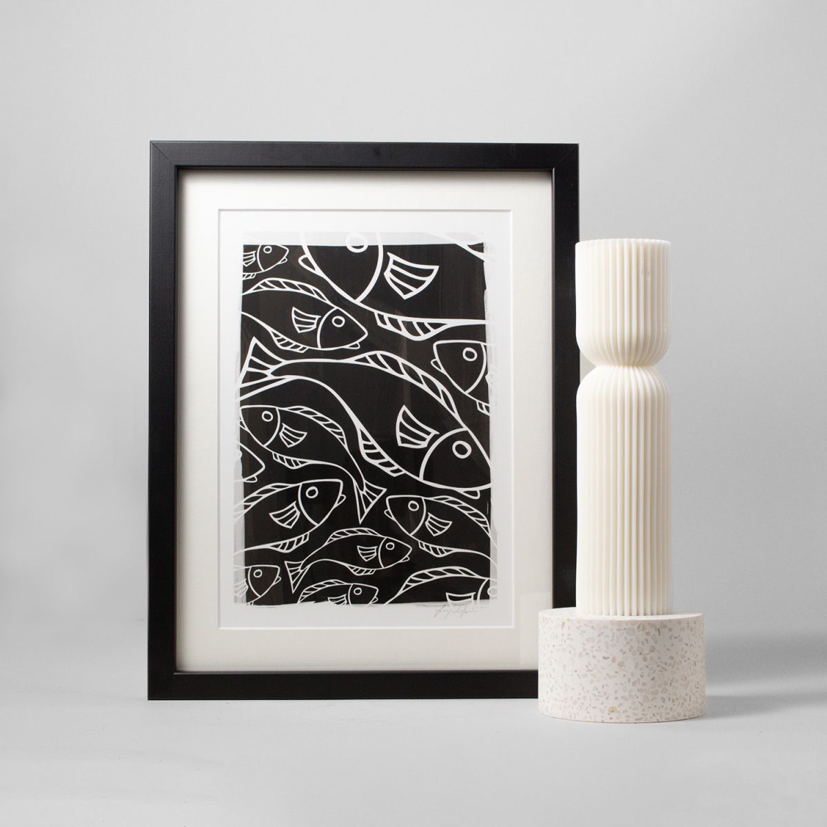 black and white Indigenous artwork and luxe candle