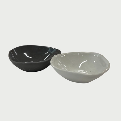 A Set of Salt and Pepper Condiment Bowls